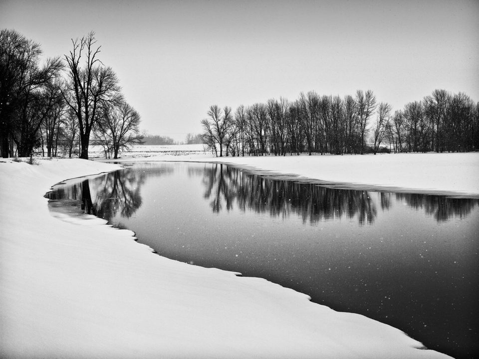 Site of the Burnt Village, black and white photograph by Keith Dotson. Looking at this placid scene blanketed in snow, it's hard to imagine it was once a battlefield. Click to buy a print.