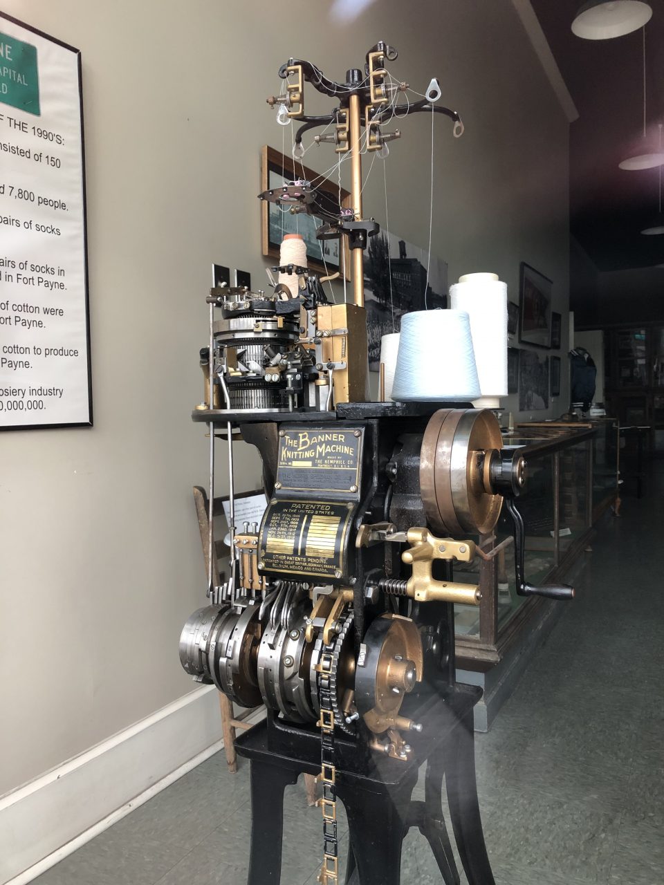 An old knitting machine seen through the window of the Hosiery Museum, which was not open at the time I was in town.