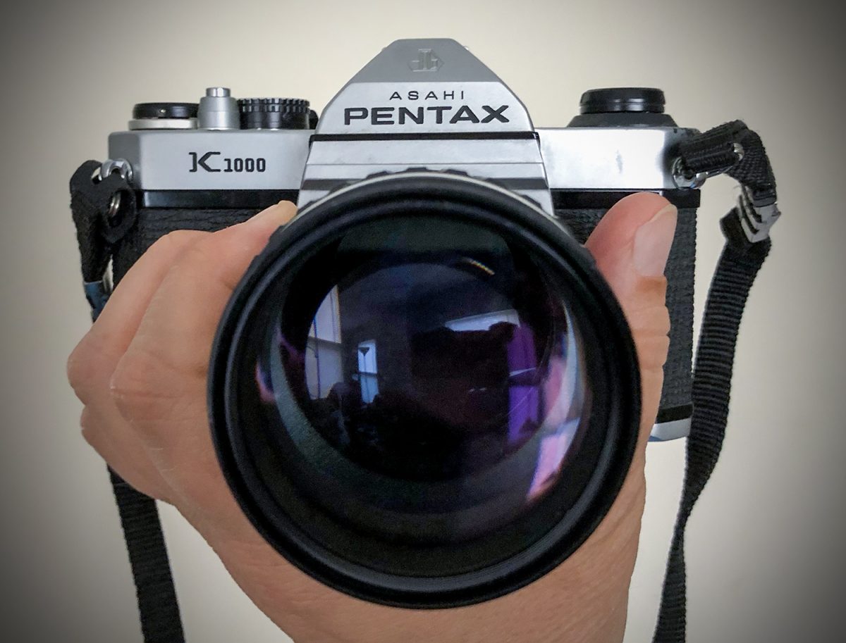 A photograph of my Pentax K1000 film camera, manufactured in Hong King in 1982 or 1983.