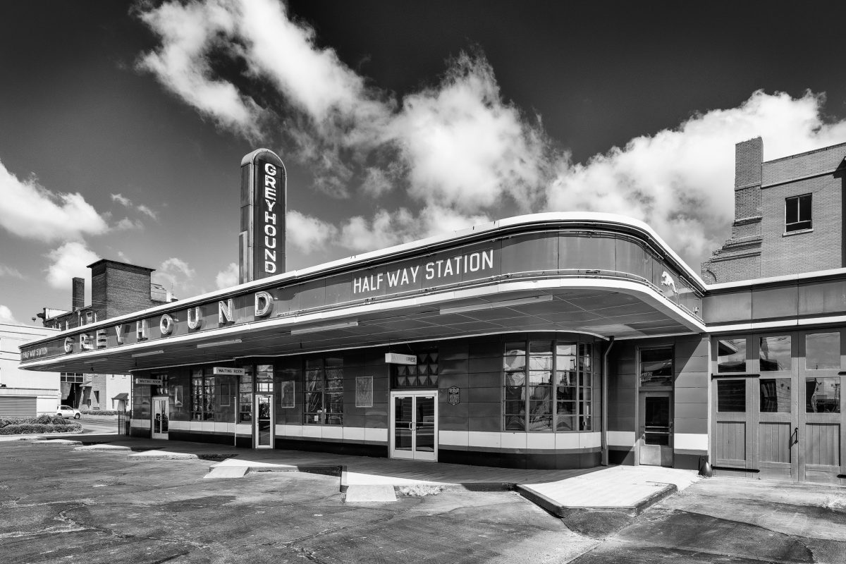 Black and white photograph of the historic Greyhound Bus Station in Jackson, Tennessee, built 1938. Fine art prints are available.