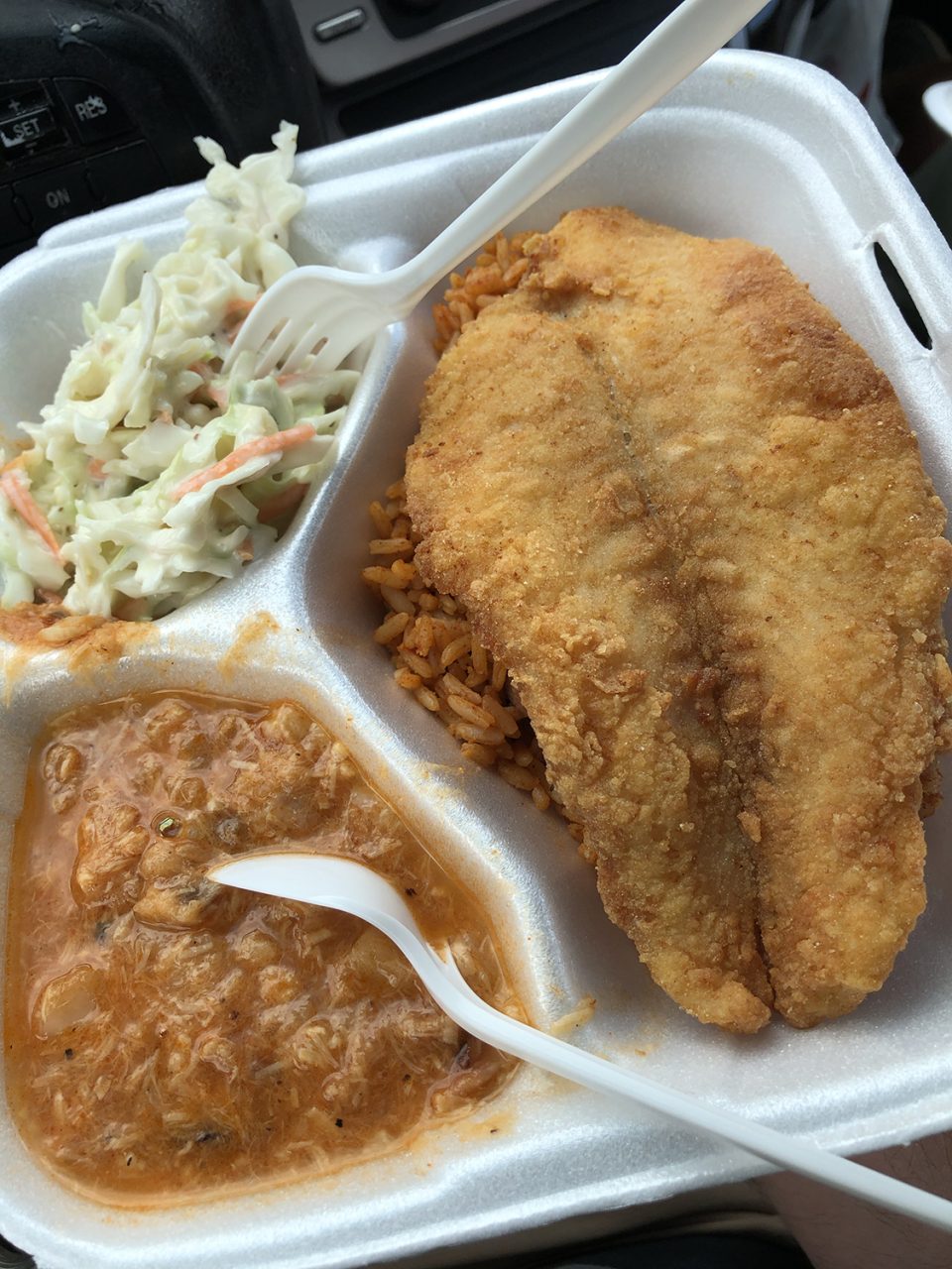 Lunch bought from a roadside vendor in the parking lot of a small market on Edisto Island. Fried catfish, jambalaya, catfish stew, and cole slaw. 