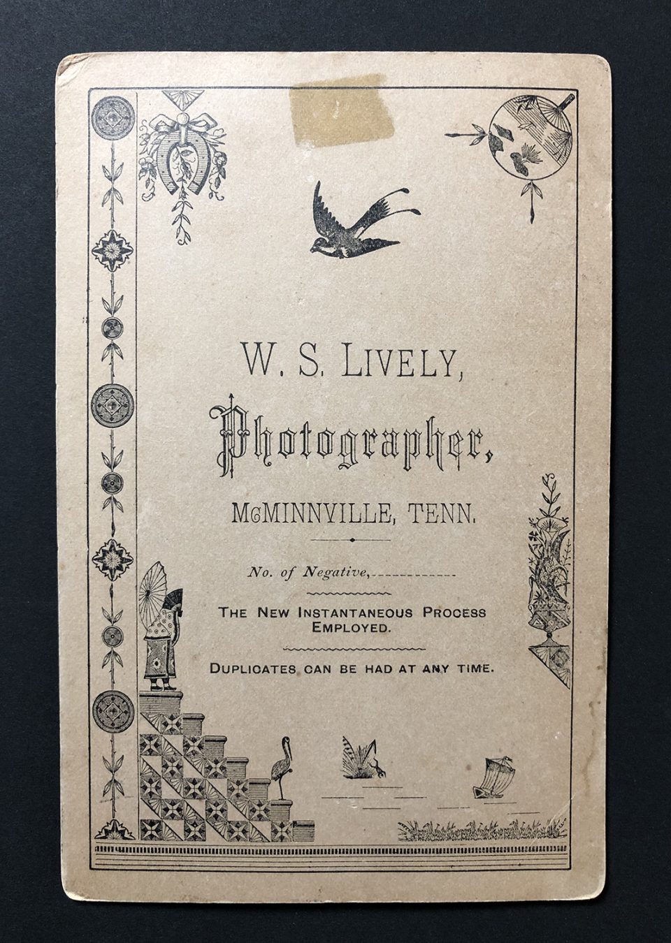 The back of the cabinet card includes fanciful woodcut clip art and the mixed and sometimes ornate styles of typography that was popular in the 1880s. 