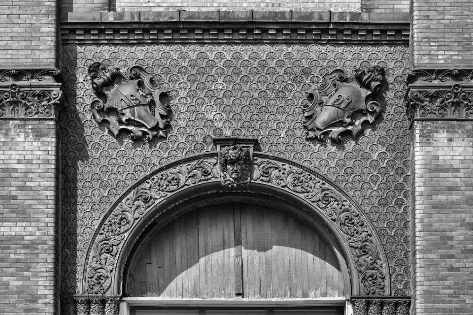 Schmulbach Brewery Arch with Ornate Tile Patterns Circa 1891: Black and White Photograph by Keith Dotson