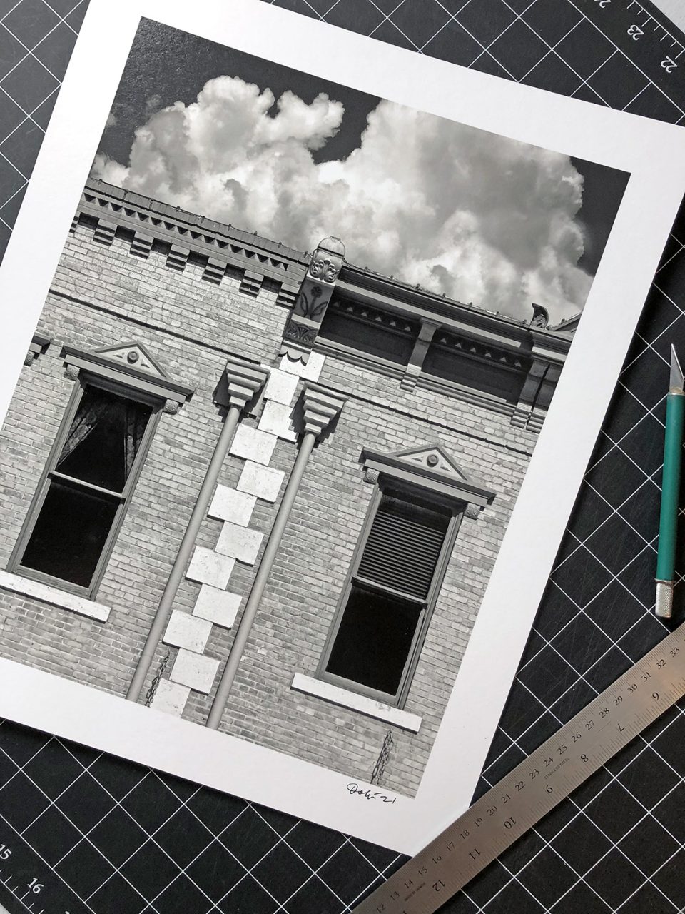 Black and white photograph of a historic building in Georgetown, Texas, shot by Keith Dotson in 2005 with an Olympus E-300 camera, printed in 2021 on Hahnemühle Fine Art Baryta paper.