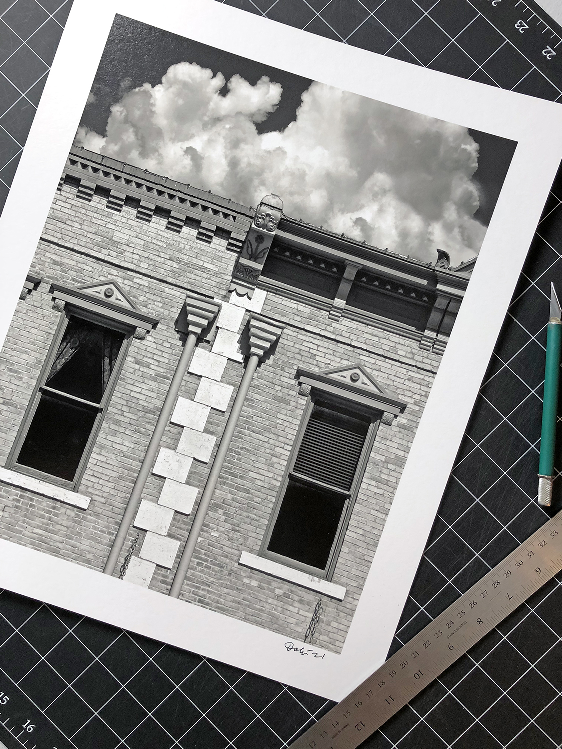 this photo shows a black and white print of an old building in Georgetown Texas shot by fine art photographer Keith Dotson.