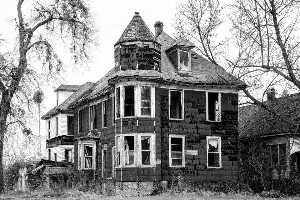 Black and white photograph of an abandoned house in Cairo, Illinois. Fine art prints are available.