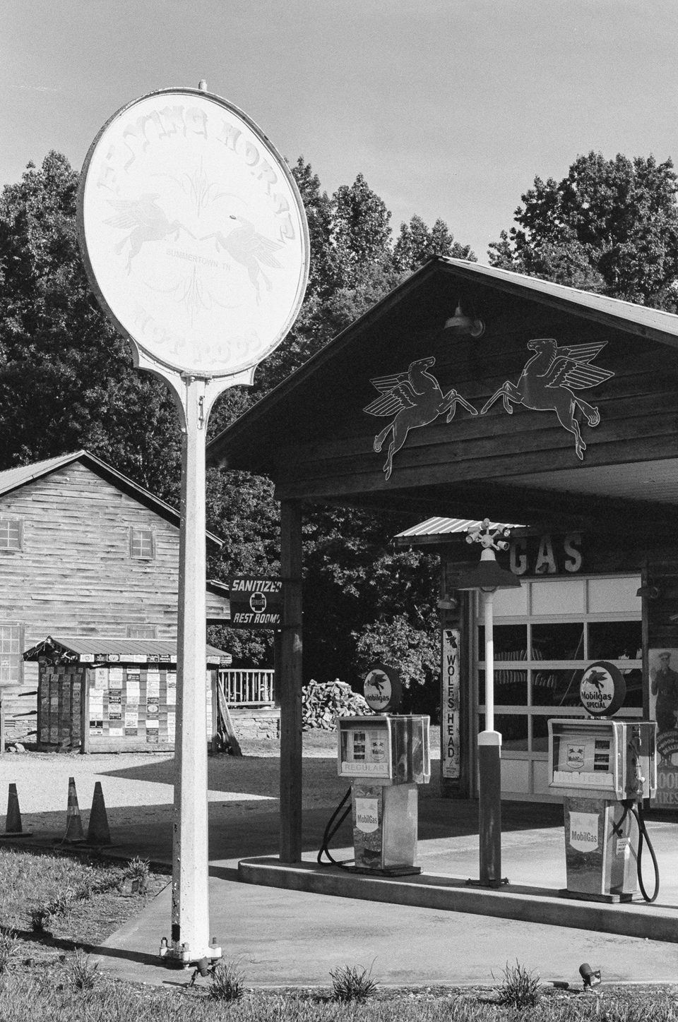 Photograph of a restored old gas station by Keith Dotson. Shot on Kodak Tri-X black and white film using a 40-year-old Pentax K1000 camera and 50mm lens.