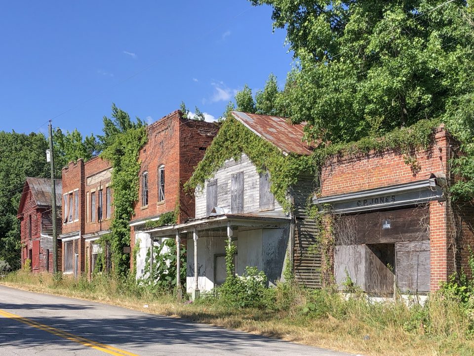 A row of abandoned storefronts along the road in Union Level, Virginia
