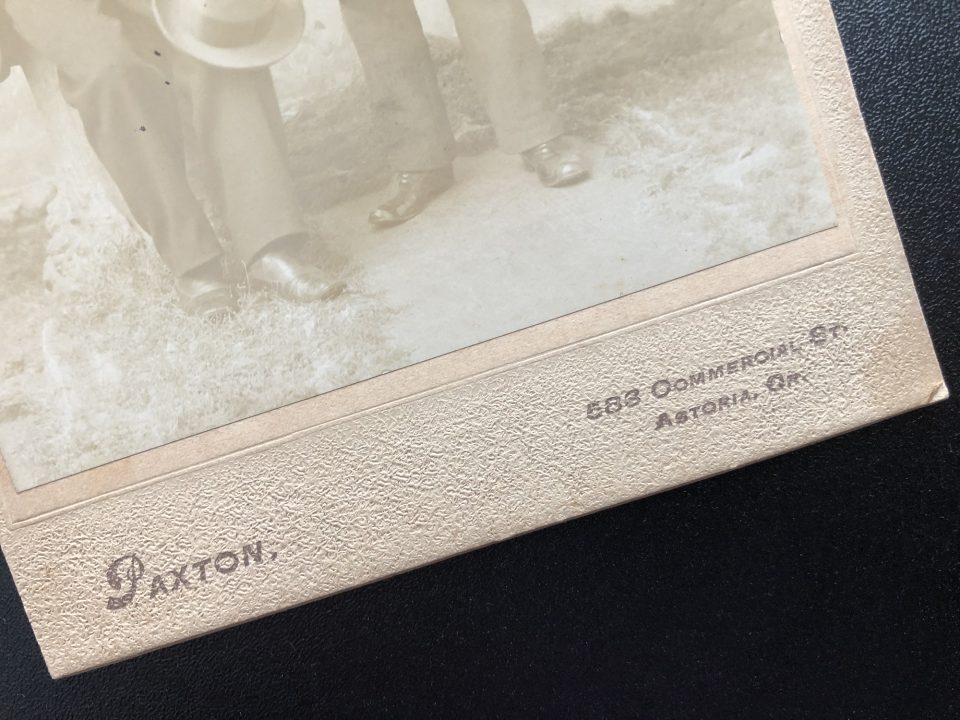 The Paxton nameplate on the front of the cabinet card.