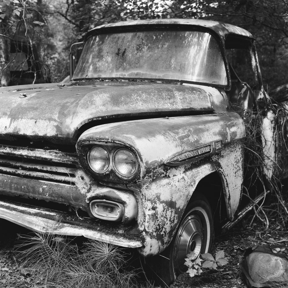 Rusty Antique Chevrolet Pickup Truck - Black and White Photograph in square format by Keith Dotson. Click to buy a fine art print.