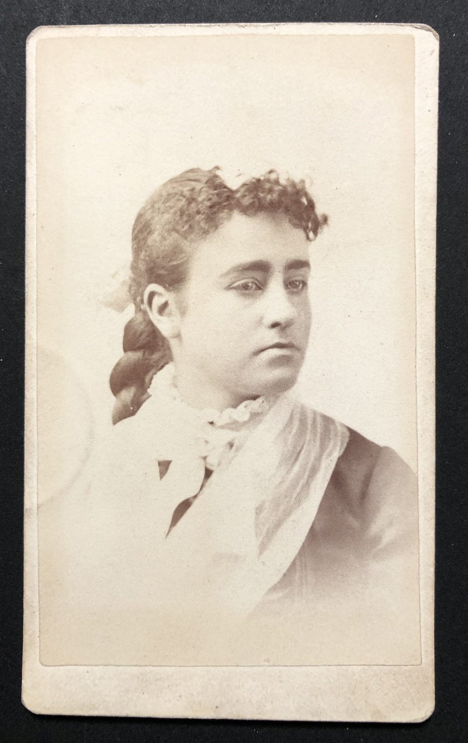 Head and shoulders portrait of a young lady by Shakopee-based photographer D.W. Kertson.