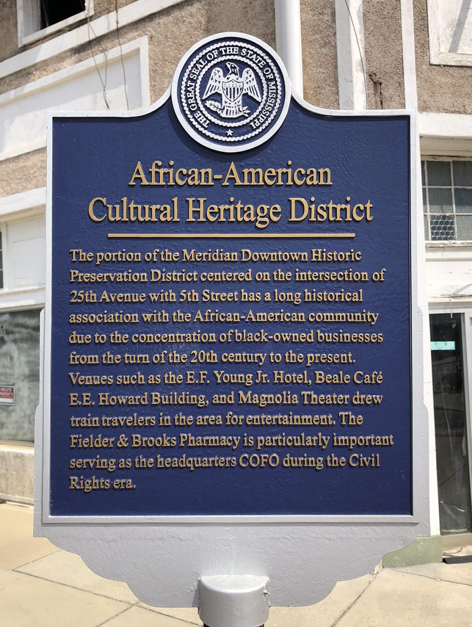 Historical marker in Meridian, Mississippi's African-American Cultural Heritage District, which includes the condemned E.F. Young Jr. Hotel.