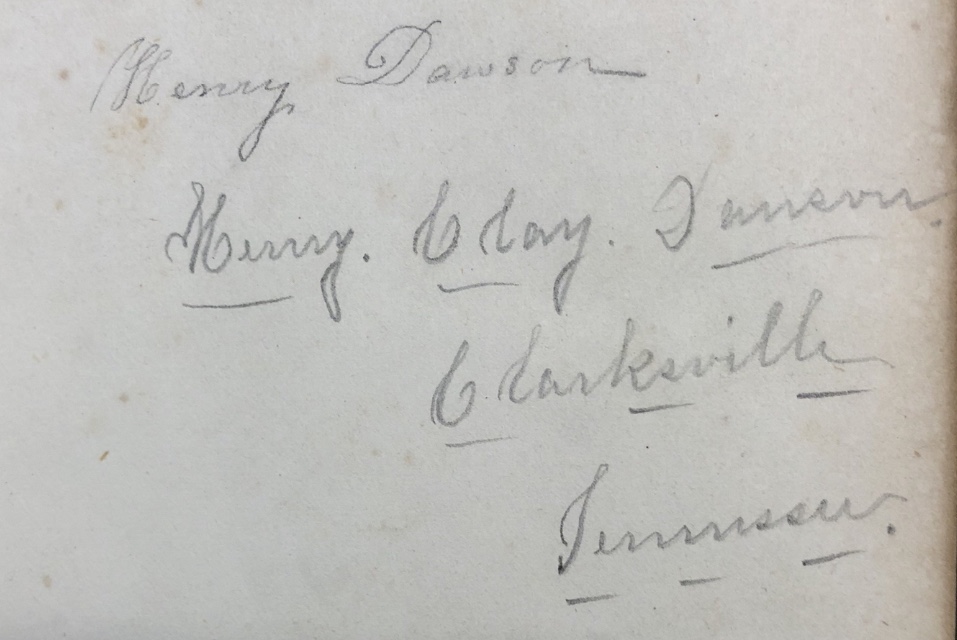 Beautifully written text inside the cover of an old 1890s book that says, "Henry Dawson. Henry Clay Dawson. Clarksville, Tennessee."