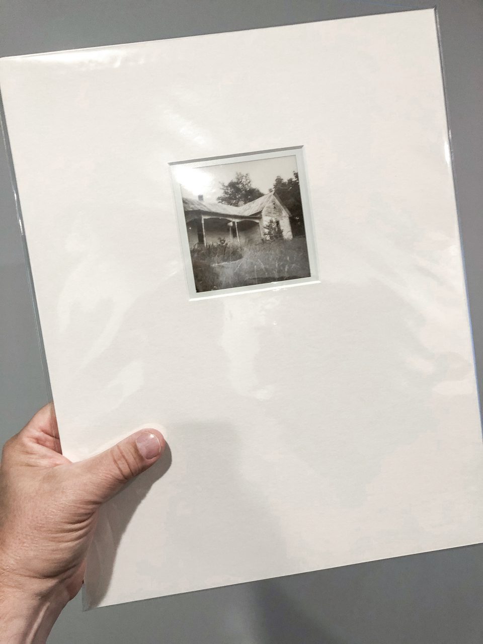 A look at the matted print of the Hollow Rock farmhouse, which has since been demolished. The entire package is held in a protective plastic sleeve which can be removed before framing.