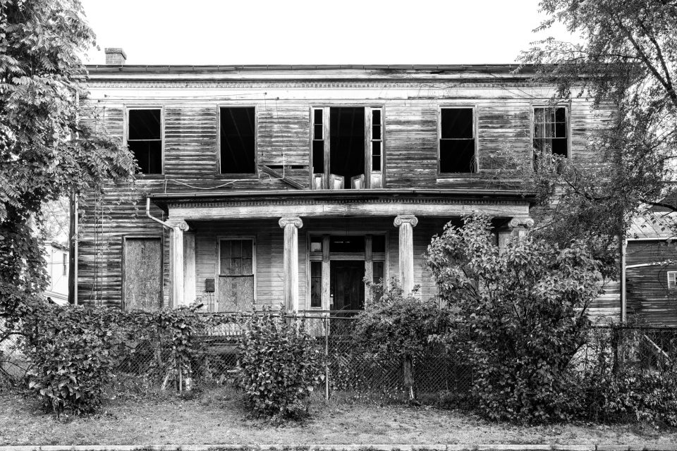 The front of the historic Judge Mark Bird House in Woodstock, Virginia - now in ruins. The house also served as a home for the Woodstock Female Seminary. Black and white photograph by Keith Dotson. Buy a fine art print here.