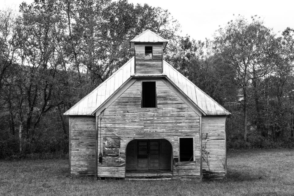 Black and white photograph of the abandoned Lays Gap School near Liberty Hill, Tennessee