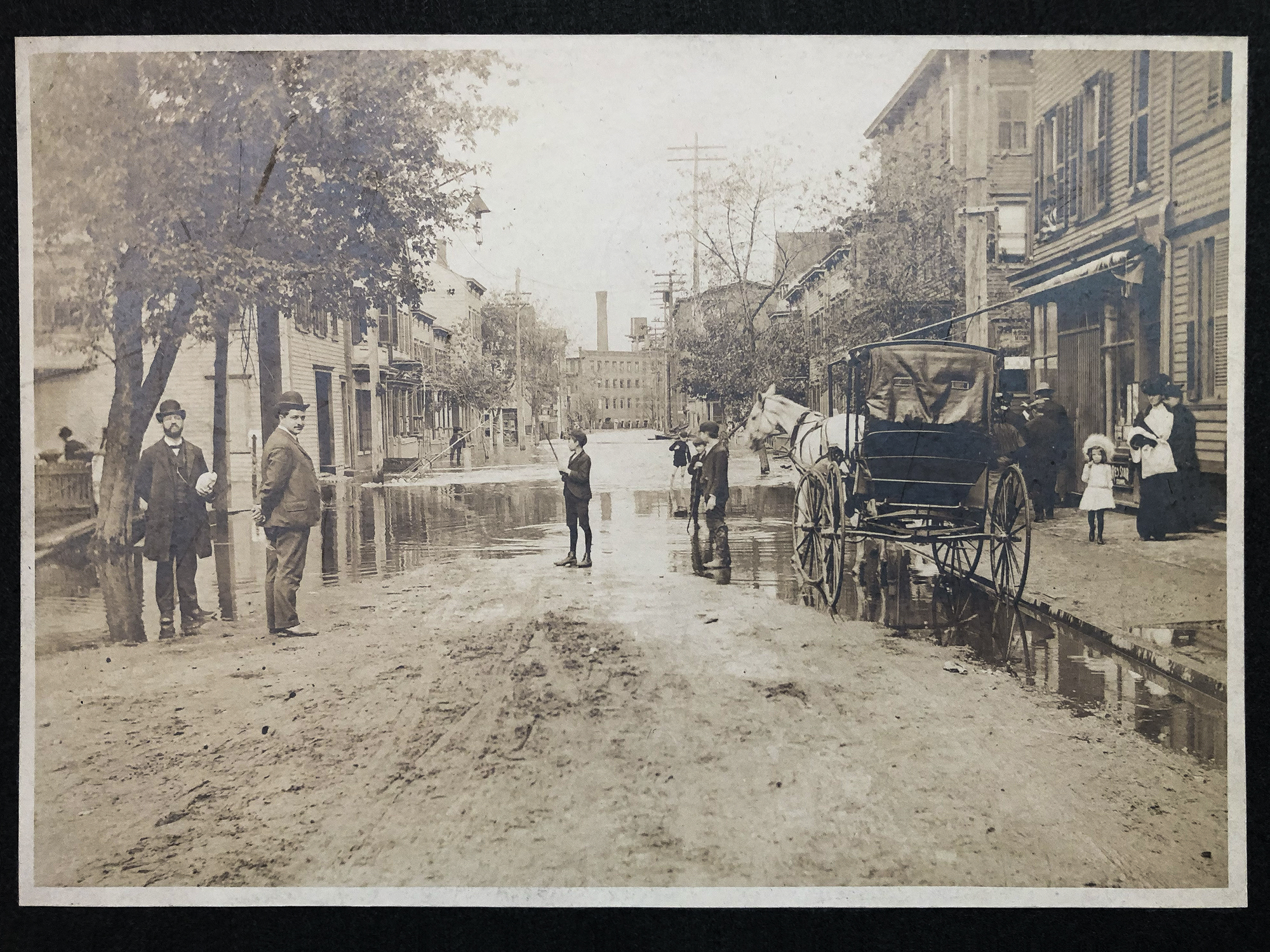 Photograph of a flooded street by an unidentified photographer. On the back in pencil is written "Taken Oct 12, 1903." Could it be a shot of the Passaic River Flood of 1903? 