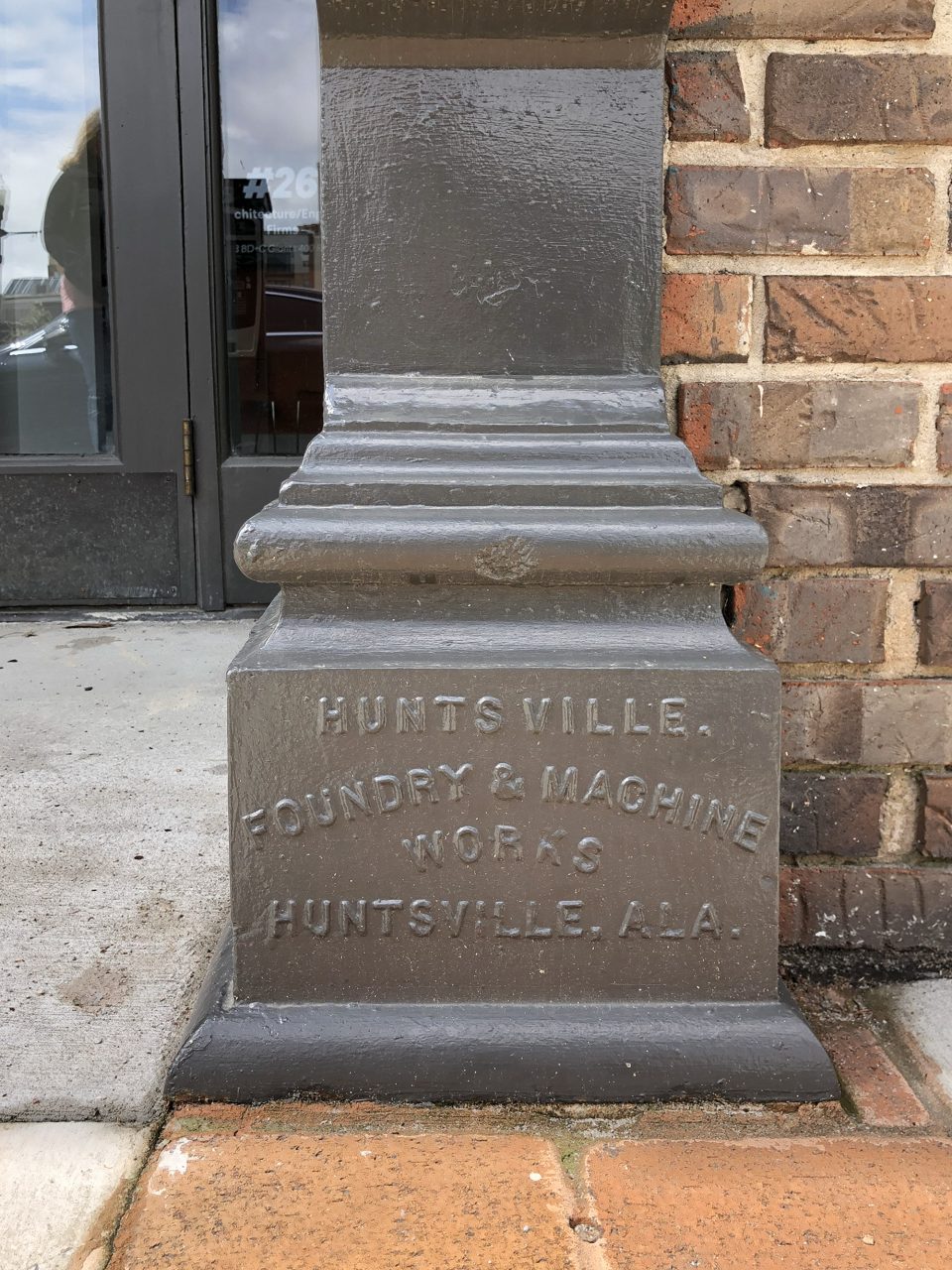 Iron work column manufactured by Huntsville Foundry and Machine Works of Huntsville, Alabama.