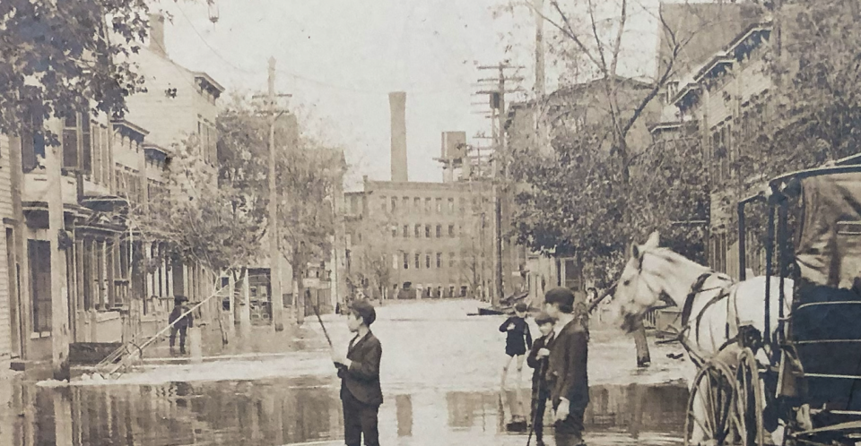 The mills in the background resemble the mills on the river in the Patterson flood photograph above.