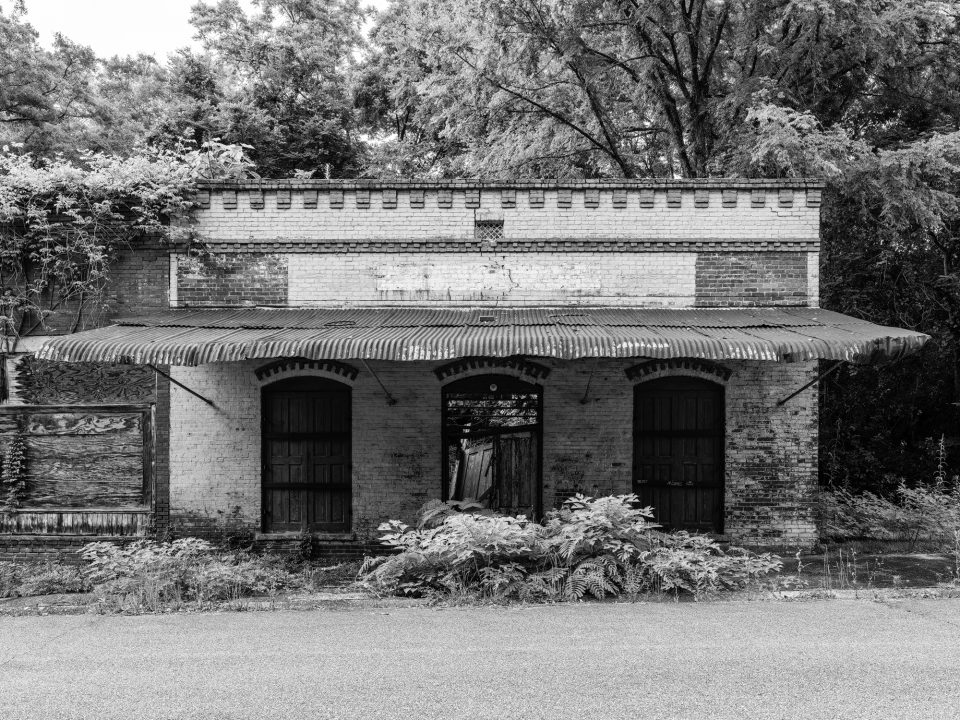 Former farm supply and feed store, now abandoned in this small Southern community.