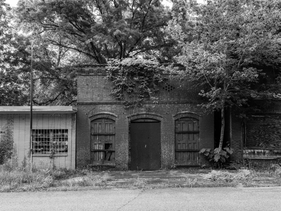 This abandoned building was probably a hardware store before it closed forever.