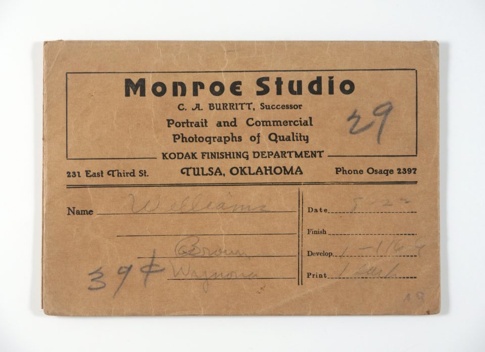 This is the brown paper envelope that has held the negatives for possibly 90 - 100 years. They were processed by Monroe Studio in Tulsa, dated 5-22, which I assume to mean May, 22, with no year specified.