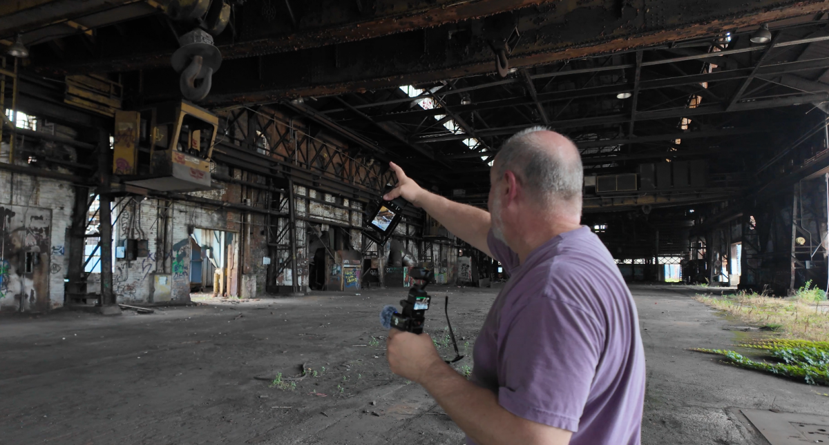 picture of photographer keith dotson inside the abandoned Wheland Foundry site in chattanooga