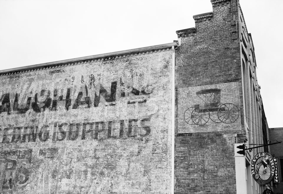 Vaughan Co. Ghost Signs in downtown Columbia, Tennessee, Black and white photograph by Keith Dotson, shot with Fuji GW690II medium format camera on Kodak TMAX 100 120 film.