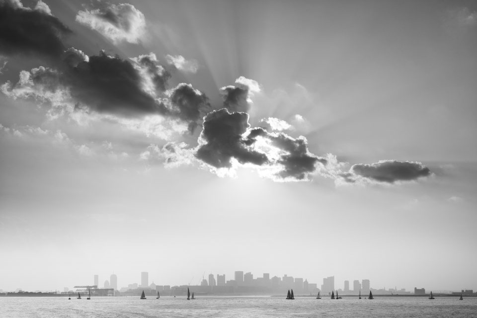 Sunset View of the Boston Skyline from the Harbor - Black and White Photograph