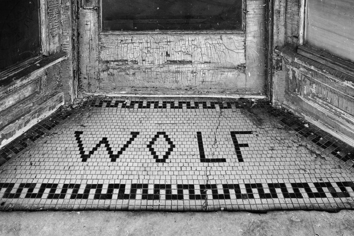 The tile floor entry way of the abandoned 1870s Wolf Building in Columbia, Tennessee