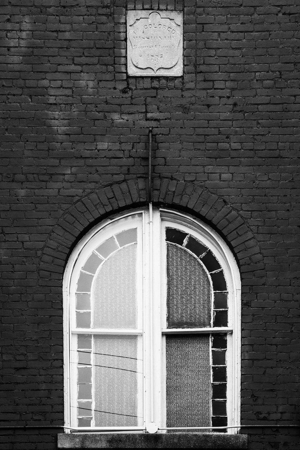 Church Window in Columbia, Tennessee, Black and white photograph by Keith Dotson.