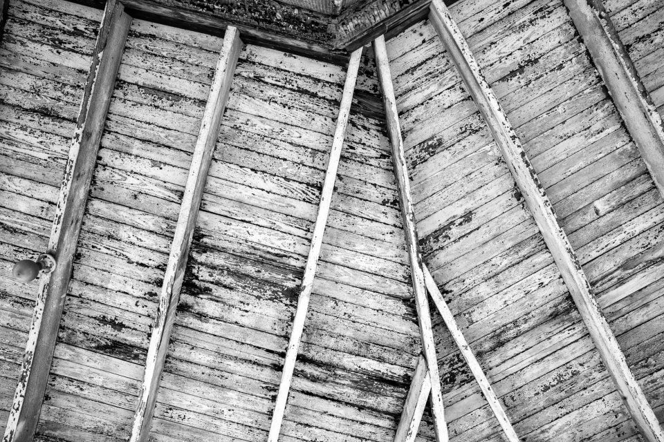 Wooden Porch Ceiling of the Wolf Building -- Columbia, Tennessee, Black and white photograph by Keith Dotson.