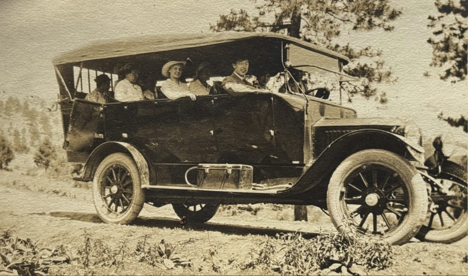 This large automobile had the capacity to carry a lot of passengers. The photo caption said, "Starting on Mountain Park Trip."