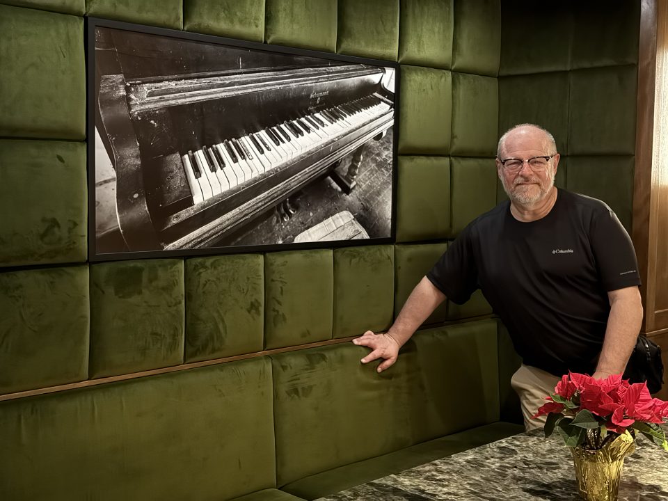 The right panel features a photograph of a dusty old piano found inside an abandoned church in a ghost town in the American South. Photograph by Keith Dotson. Portrait of Keith Dotson by Teena Young.