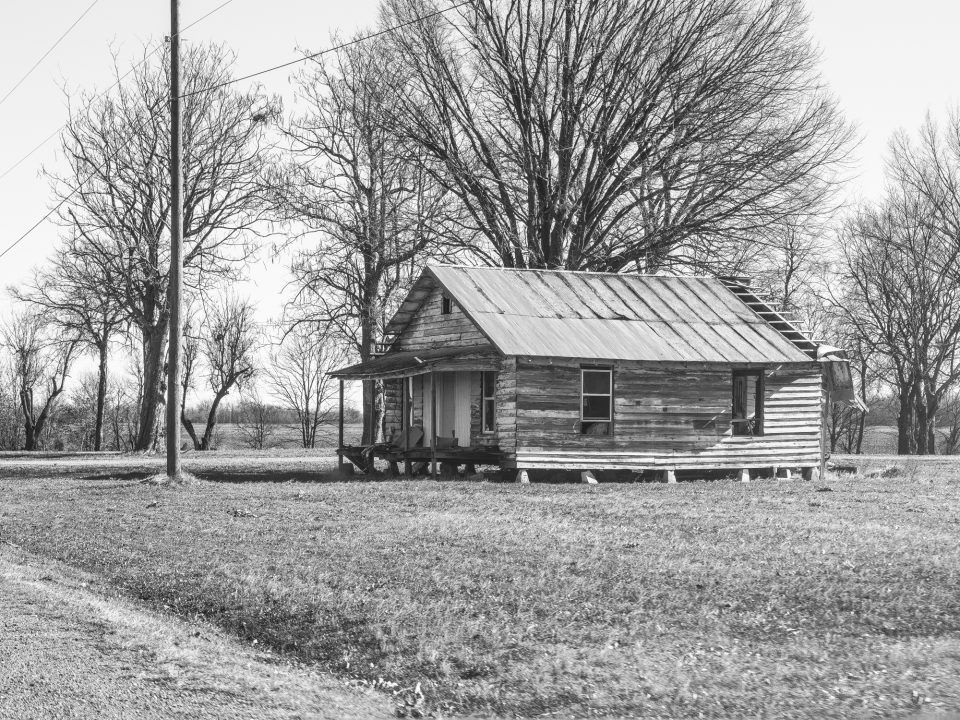 Keith Dotson's black and white photograph of a wonderful old house found on the highway somewhere between Brinkley and Hughes, in the Arkansas Delta.