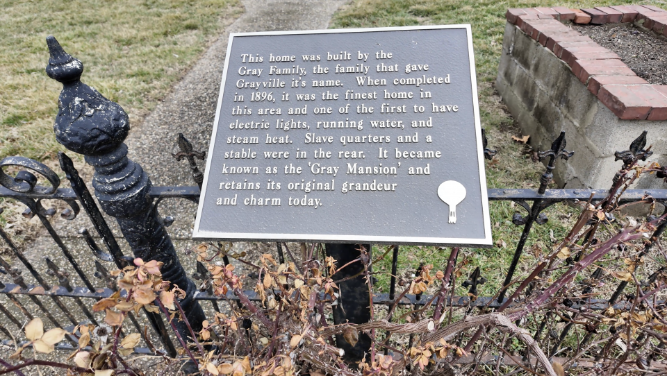 A placard posted in front of the William W. Gray House gives a different historical account than that of the National Register of Historic Places application.