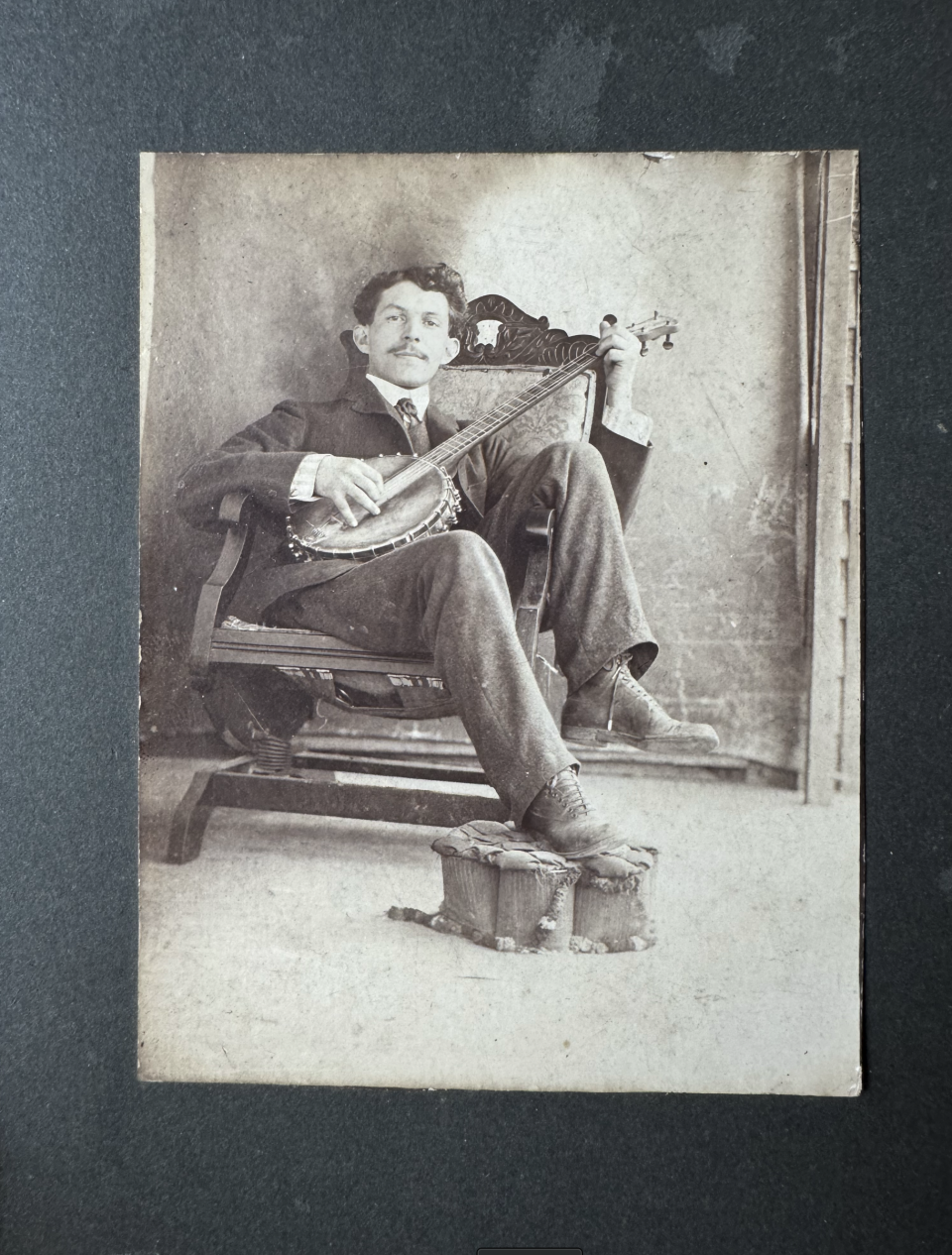 I asked A.I. to analyze this cabinet card portrait of a man playing a banjo. The results were surprisingly detailed and fascinating.