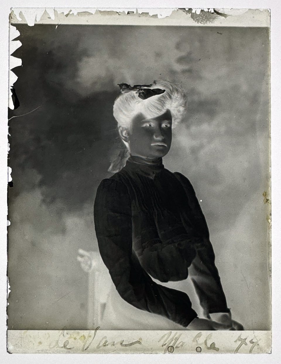 This negative has been inscribed with a name -- it seems to say De Van, Mable and is numbered. Searches for that name came up empty.