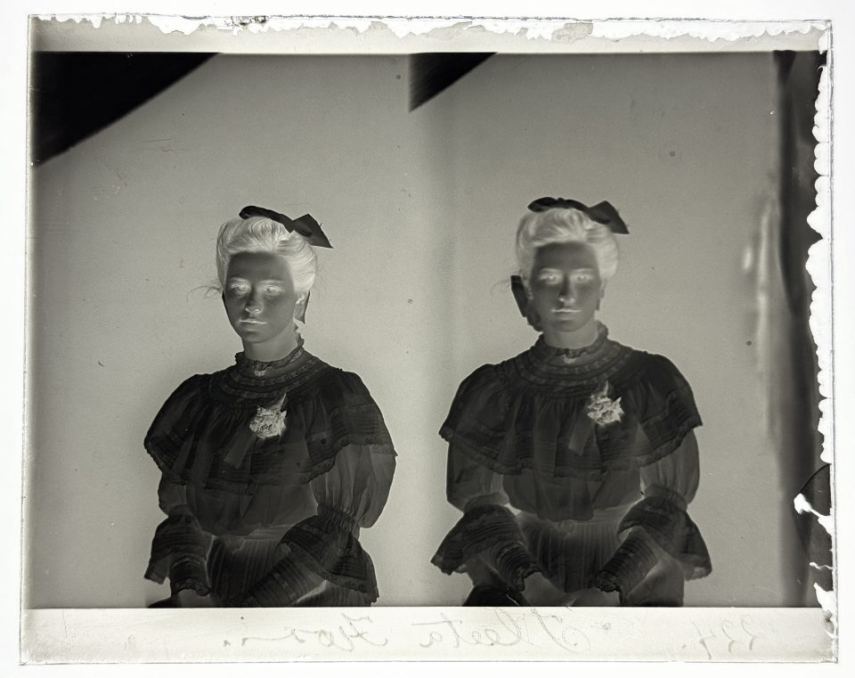 This young lady with the name inscribed "Flora Fleeta," was probably photographed between 1905 and 1910, based on her so-called "lingerie dress," called that because of the fabric and use of lace elements. AI also identified her Gibson Girl hairstyle and the Edwardian era silhouette of her dress.