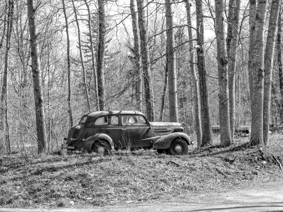 Antique car abandoned along the road leading to the Olson House, near Cushing, Maine. Photograph by Keith Dotson. Fine art photographic prints are available.