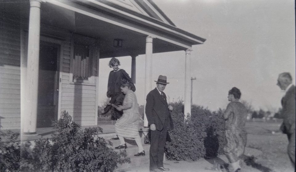 Visitors at the farmhouse.