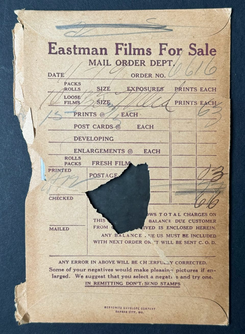 The opposite side of the negative folder gives a date of 11-19, which probably indicates November 19. The entire order came to a total price of 66 cents.