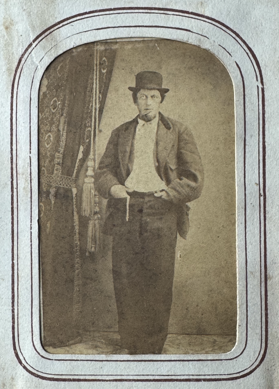 Carte de visite portrait of an unidentified man in a bowler hat, sack coat, and baggy trouser. Probably late 1860s - 1870s.
