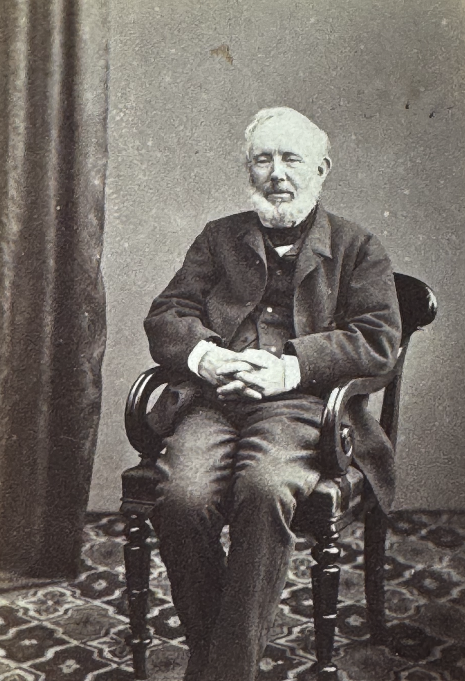 Distinguished carte de visite portrait of a well-dressed white-haired gentleman who was not identified.