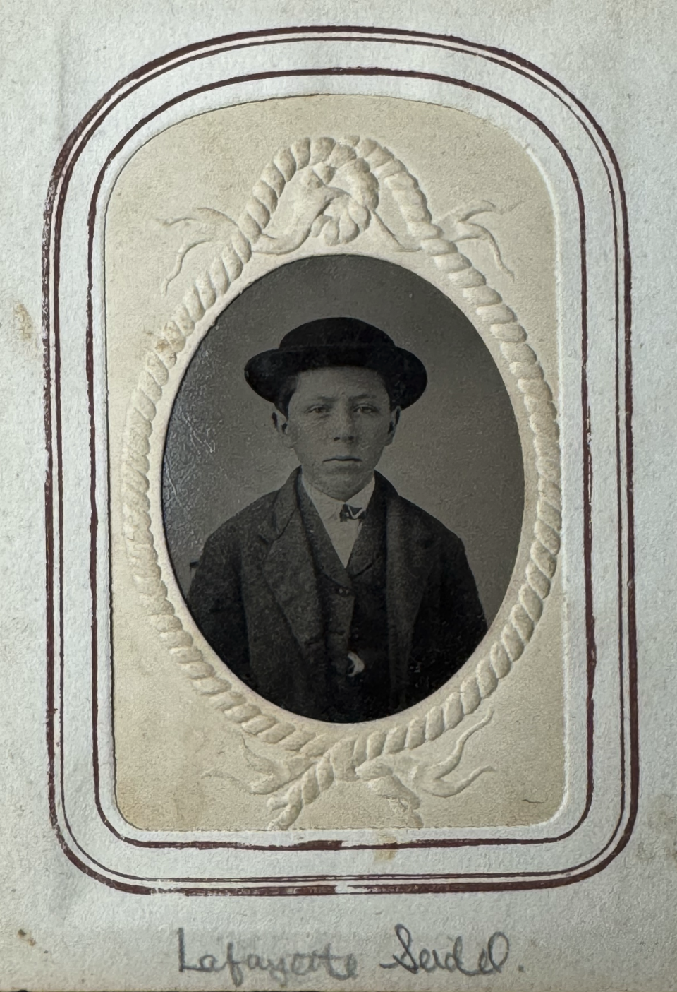 Tintype portrait of a boy named Lafayette Seidel.