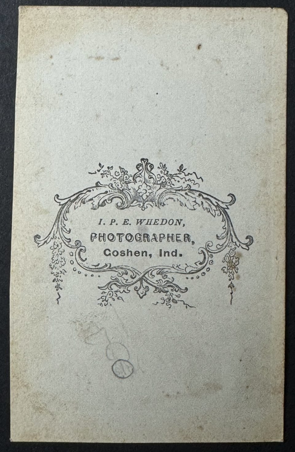 The above portrait was made by the studio of I.P.E. Whedon of Goshen, Indiana. Whedon operated from 1868-1873 in Goshen, in northeast Indiana not far from the Michigan state line. According to The Indiana Album, he operated on Main Street in a space of J.L. Kindig's store.