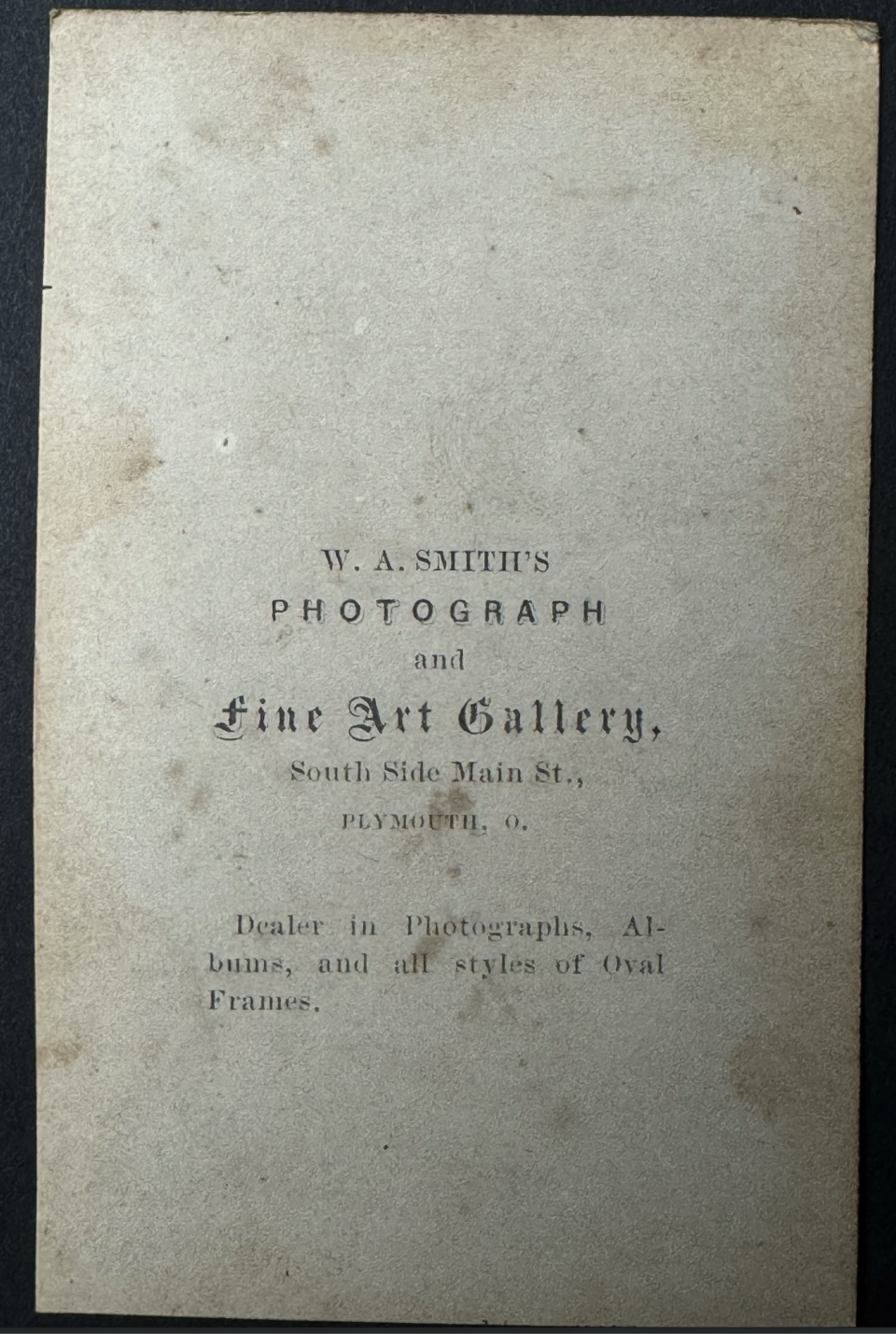 Imprint of the South Side Main Street studio of W.A. Smith of Plymouth, Ohio, from the back of a carte de visite portrait of the young man (above) probably made in the 1860s.