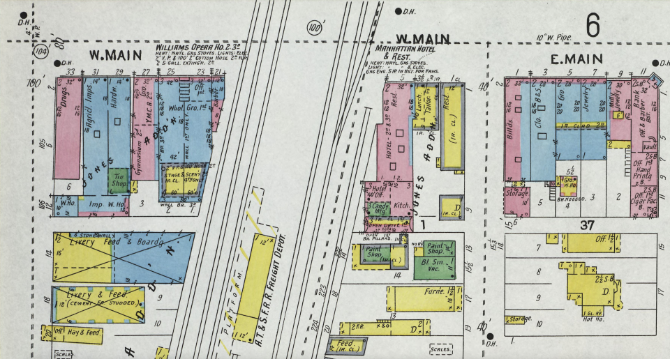 1906 Sanborn Fire Map shows the Wholesale Grocery with reference of the Opera House at top left next to the railroad tracks.